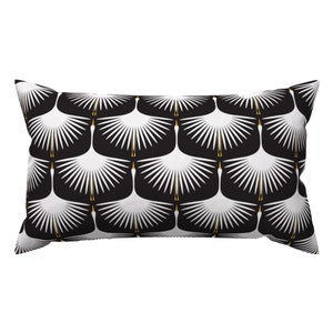 May include: Black and white throw pillow with a geometric pattern of white cranes with gold accents.