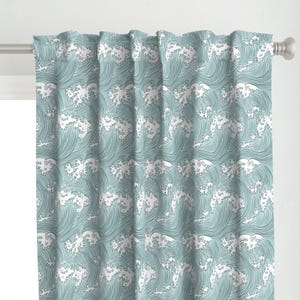 May include: Teal blue curtains with a white wave pattern. The waves are drawn in a simple, stylized design.