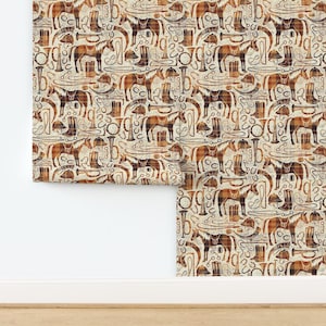 May include: Wallpaper roll featuring a repeating pattern of horses, cowboy hats, boots, horseshoes, and other equestrian-themed elements in shades of brown and tan. The design has a vintage, rustic aesthetic.