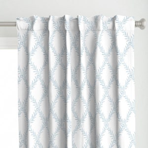 May include: White curtains with a light blue pattern of repeating diagonal lines of leaves.