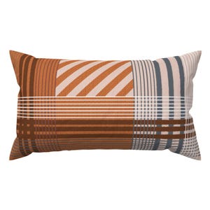 May include: Rectangular decorative pillow with a patchwork design. The pillow features a mix of patterns, including stripes, diagonal lines, and plaid, in shades of brown, orange, beige, and blue. The pillow is designed for home decor.
