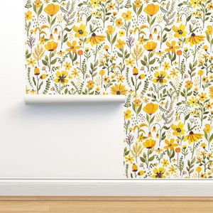 May include: A white background with a repeating pattern of yellow flowers and green leaves. The pattern is a wallpaper design.