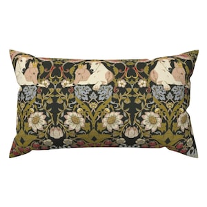 May include: A rectangular pillow with a dark green background featuring a repeating pattern of stylized flowers, leaves, and white dogs wearing crowns. The pattern is in shades of green, yellow, red, and white.