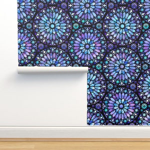 May include: A repeating pattern of stained glass windows in shades of blue, purple, and white on a black background. The design features a circular pattern with a star in the center.