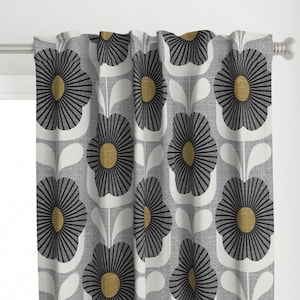 May include: Gray and white curtains with a repeating pattern of black and gold stylized flowers.