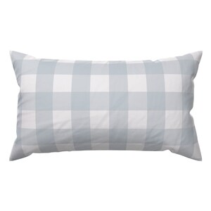 May include: A light blue and white checkered pillow with a rectangular shape.