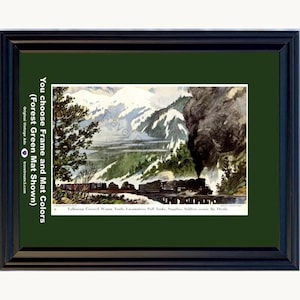 May include: A framed print featuring a vintage illustration of a steam locomotive traveling through a snowy mountain landscape. The artwork is set within a dark green mat and a black frame. Text on the left reads: You choose Frame and Mat Colors.