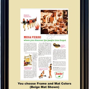 May include: Framed vintage advertisement for Mesa Verde National Park, featuring illustrations of ancient dwellings and people. The ad includes text about the park's history and the Sinclair logo. The frame is black, and the mat is beige.