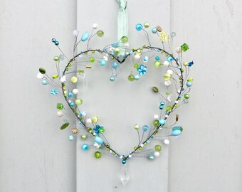 Great beaded sequin wreath made of wire for window decoration in turquoise and green