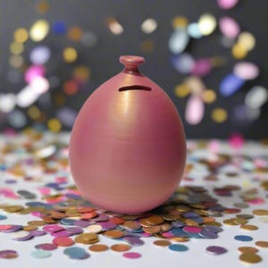 Cofrinho em forma de balão, feito à mão em cerâmica italiana.