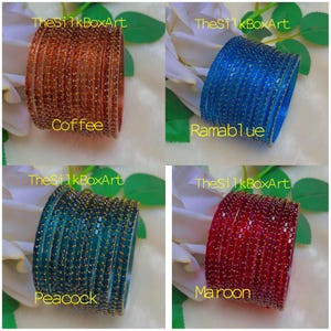 May include: Four stacks of colourful bangles in coffee, Ramablue, peacock, and maroon. Each stack is made of many small, square-shaped beads. The text "TheSilkBoxArt" is in the top left corner of each image, and the colour names are written below each stack.