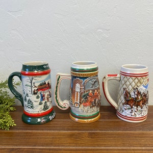 &quot;Set von 3 Sammler Budweiser &quot;&quot;Holiday&quot;&quot; Bierkrügen - Versionen von 1985, 1991 und 1997.&quot;