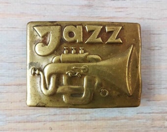 Belt buckle, Jazz, Music instrument, Brass belt buckle, Vintage belt buckle