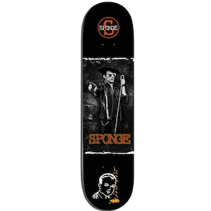 May include: Black skateboard with a graphic of a man in a hat and sunglasses holding a microphone. The word "SPONGE" is printed in orange. A logo with the letter "S" in a circle is at the top.
