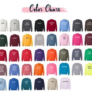 May include: Color chart showing 48 different sweatshirt colors. The colors are arranged in rows and columns. Each color has a name written below it.