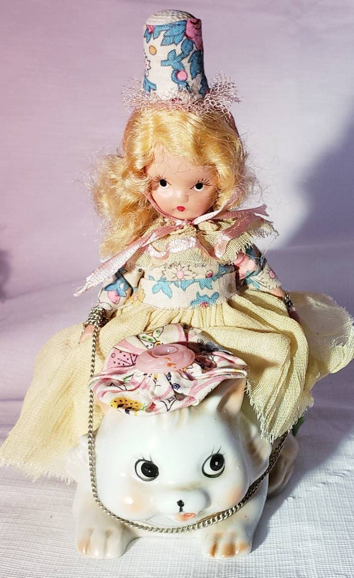 doll and cat