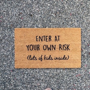 Enter At Your Own Risk (Kids) Doormat