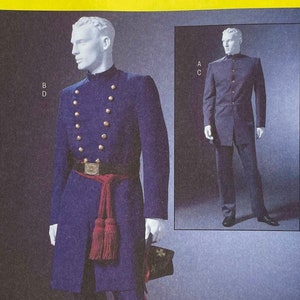 May include: A sewing pattern for a men's costume. The pattern is for a long, dark blue coat with gold buttons and a red sash. The pattern is from McCall's Costumes and is size XN (XIg-XXI-XXXI).