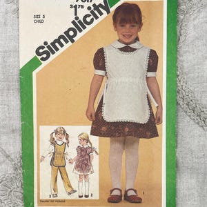 Simplicity 9817 Child's Alice Style Dress and Tabard Apron Sewing Pattern and Pull-On Pants - Cut Size 5 (24")