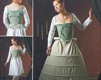 May include: A sewing pattern illustration featuring a bodice and skirt ensemble. The bodice is green with a white damask pattern, featuring a square neckline and lace-up back. The skirt is a solid light beige with horizontal stitched tiers.
