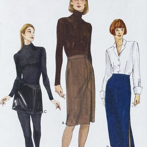 May include: Illustration of three women's outfits. One woman wears a black turtleneck and a black wrap skirt. Another wears a brown turtleneck and a brown wrap skirt. The third wears a white button-down shirt and a blue pinstripe skirt.