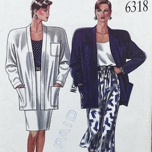 May include: A sewing pattern envelope labeled 6318 featuring illustrations of two outfits. One shows a white blazer over a dark polka dot top and white skirt. The other shows a dark blue blazer over a white top and a white skirt with blue brushstroke patterns.