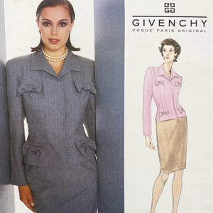 May include: A woman in a grey pinstripe suit with bow details on the pockets and jacket. The image also features a fashion illustration of a pink jacket and skirt. The Givenchy logo is visible.