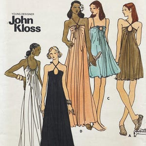 May include: A sewing pattern illustration by John Kloss featuring five variations of a dress with a halter neckline and gathered bodice. The designs include floor-length and knee-length options in white, black, peach, light blue, and brown.