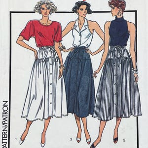 May include: Illustration of three outfits: a red top with a white button-down skirt, a white halter top with a blue button-down skirt, and a navy top with a striped button-down skirt. The outfits are styled with belts.
