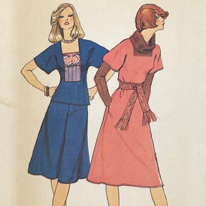 May include: Two fashion illustrations of women wearing dresses. The woman on the left is wearing a blue dress with a floral and striped pattern on the bodice. The woman on the right is wearing a pink dress with a brown belt and a brown scarf.