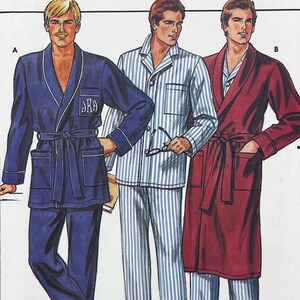May include: A sewing pattern illustration featuring three loungewear options. Option A shows a navy blue robe with white piping and a monogrammed pocket. The center figure wears a blue and white striped pajama set. Option B is a long maroon robe.
