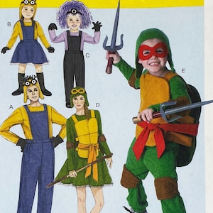 McCall's 7214 Cartoon Charakter Schnittmuster mit Mutanten Schildkröten und gelbem Minion - Uncut Größe S-XL