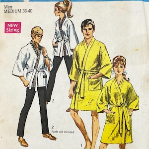 May include: A sewing pattern illustration featuring two styles of loungewear. One style is a white jacket with a patterned trim and matching pants. The other is a yellow robe with a tie waist and pockets. Text includes Men MEDIUM 38-40.