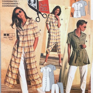 May include: A vintage sewing pattern showcasing women's fashion designs. The pattern includes a long, button-down shirt dress in a plaid design, a short-sleeved shirt with a belt, and a short-sleeved shirt with trousers. The text on the pattern reads "The Sandra Betzina Collection".