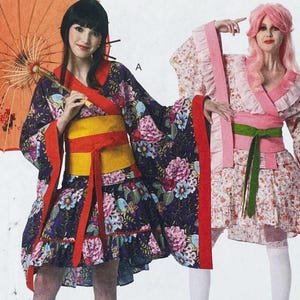 May include: Two outfits featuring kimono-style tops with wide sleeves and ruffled hems. One is dark purple with a floral pattern, a yellow sash, and a red trim, paired with an orange parasol. The other is light pink with a floral print and a green sash.