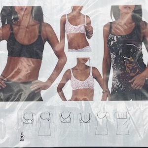 May include: A collection of nursing undergarments including a black bra, a white floral print bra, and a dark patterned tank top. The image displays technical line drawings showing the front and back views of the bras and tank tops with clips.