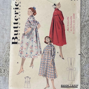 May include: A vintage Butterick printed pattern envelope featuring illustrations of three different coat styles. The cover displays the text Butterick, 50c, Quick 'n Easy, and Not Returnable or Exchangeable De Ruiter's Dry Goods on a cream background.