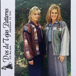 May include: Two knit cardigans featuring patterned designs. The left cardigan is burgundy with geometric accents, worn over a dark purple shirt. The right cardigan is grey with green and blue vertical stripes, worn over a light blue collared shirt.