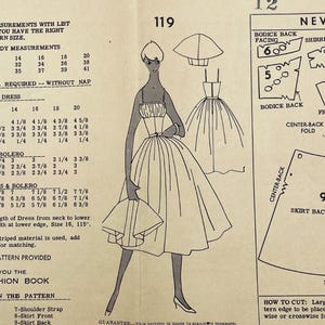 May include: A vintage sewing pattern instruction sheet labeled 119, featuring a black and white line drawing of a dress with a gathered bodice, thin straps, and a full skirt, alongside technical diagrams for bodice back facing and skirt back pieces.