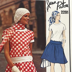 May include: Vintage sewing pattern for a gingham dress and a skirt with a white top. The pattern is by Jean Patou and the pattern number is 2291.