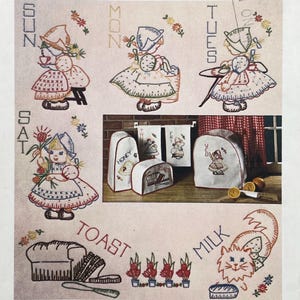 May include: A collection of vintage-style embroidery patterns featuring seven days of the week, each depicted with a child in a bonnet, alongside kitchen-themed motifs like a loaf of bread, a cat, and finished fabric covers for kitchen items.