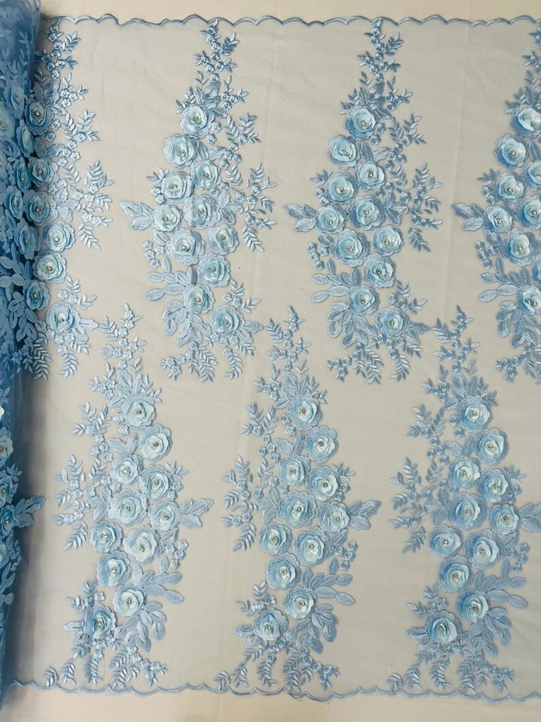 Light blue 3D floral Vine Design Embroider and heavy beading on a mesh lace-sold by the yard.