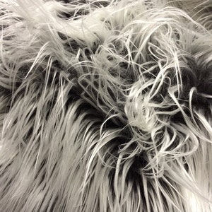 Gray/silver frost Mongolian fake fur.3 inch pile.36x60 inches. Sold by the yard.