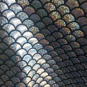 Silver mermaid fish scale spandex.36x50 inches. Sold by the yard.