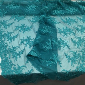 Teal Rosemallow Flower Design Embroidered on a Mesh Lace - Sold by the Yard