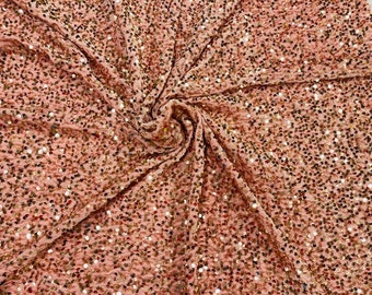 Shiny Sequins on a 2 Way Stretch Velvet. Sold by Yard. Rose Gold