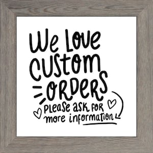 May include: A white sign with black text that reads "We love custom orders. Please ask for more information." The sign has two small hearts on either side of the text.
