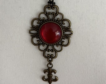 Adjustable chain ornament bronze with fleur de lis