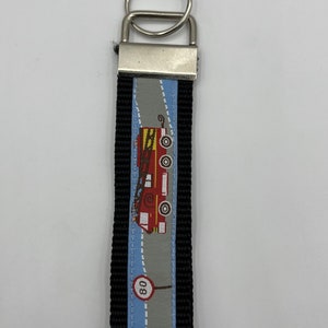Lanyard met voertuigen - stijlvolle metgezel voor sleutels, tassen en rugzakken