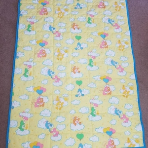 Vintage fabric quilts - crib quilts  - care bears - precious moments- gender neutral quilts -